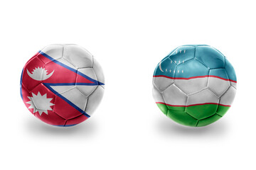 Obraz premium football balls with national flags of uzbekistan and nepal ,soccer teams. on the white background.