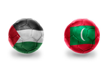 football balls with national flags of maldives and palestine ,soccer teams. on the white background.