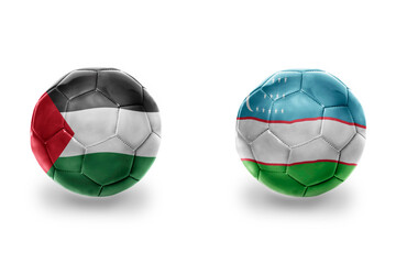Fototapeta premium football balls with national flags of uzbekistan and palestine ,soccer teams. on the white background.