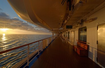 sunset on a deck of a ship