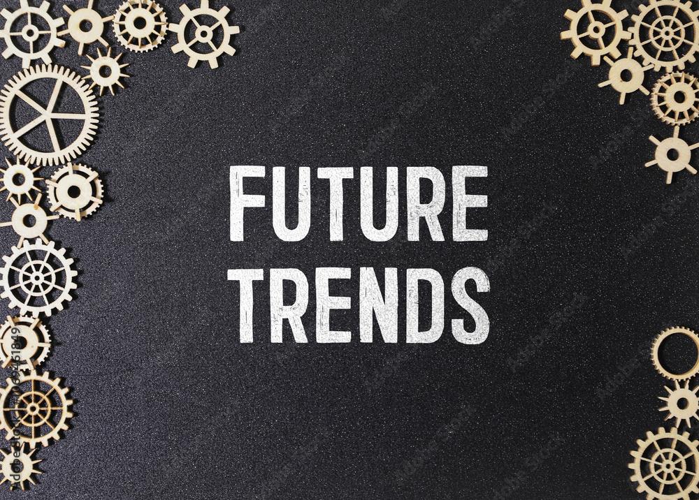 Poster future trends text on a notebook with chart on wooden background