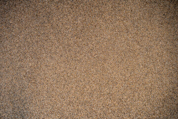 Texture of sand on the beach close-up.