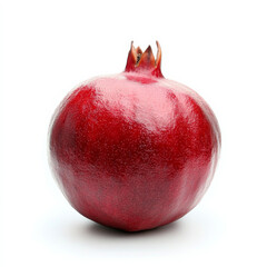 Fototapeta premium A single fresh pomegranate, isolated on a white background, emphasizing a juicy and nutritious fruit