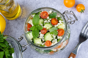 Tabbouleh salad national traditional food middle eastern. Healthy vegetarian food. Muslim family dinner, Ramadan, iftar. Arabian cuisine. top view