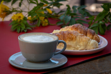 cup of coffee and croissants