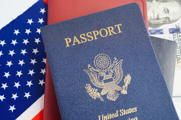 US passport issued to citizen and national of the United States of America to travel in most countries outside with USA flag and dollar money.