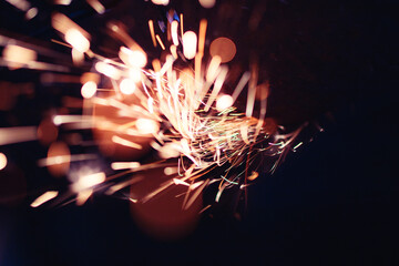 A bright flash of light and a sheaf of sparks in a cloud of smoke. Miniature Universe. Design...