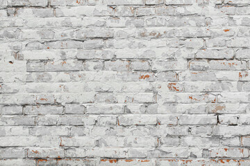 White shabby grungy brick wall. Free space for an inscription. Can be used as a background or...