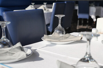 An Elegant Dining Setup featuring Beautiful Glasses and Plates for a Sophisticated Experience