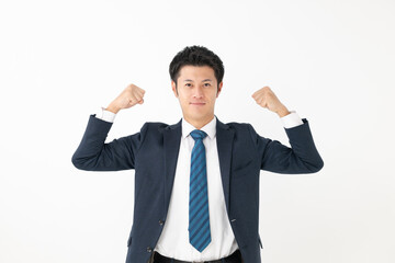 ガッツポーズをするビジネスマン