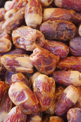  many date fruits display for sale at local market 