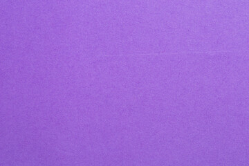 A purple background with a white and black pattern, textured origami paper backdrop