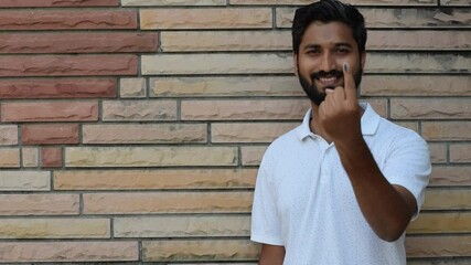 Video of an Indian man showing his finger after casting vote in election. Lok sabha, vidhan sabha, polls, election commission of india, technology, democarcy, voice