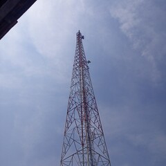 A telecommunications tower is a building that functions as a support for a telecommunications network whose design/construction form is adapted to the needs of the telecommunications network.