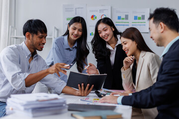 Asian business people working together in the office, Young asian people at business meeting.
