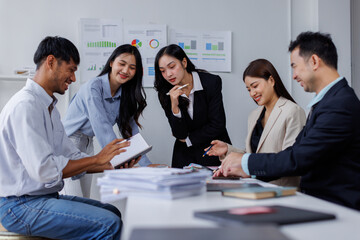 Asian business people working together in the office, Young asian people at business meeting.

