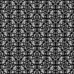 Floral pattern. Vintage wallpaper in the Baroque style. Seamless vector background. White and black ornament for fabric, wallpaper, packaging. Ornate Damask flower ornament.