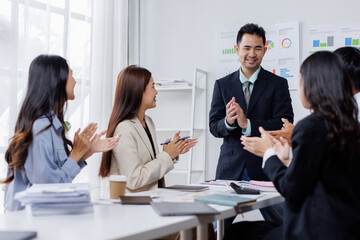 Asian business people working together in the office, Young asian people at business meeting.

