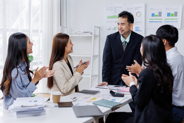 Asian business people working together in the office, Young asian people at business meeting.

