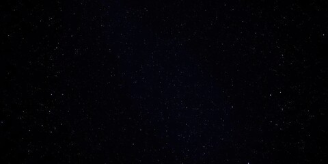 Obraz premium A mesmerizing night sky filled with twinkling stars against a deep black background, galaxy, serene, astronomy