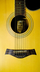 Close-up detail of a classical guitar sound hole.