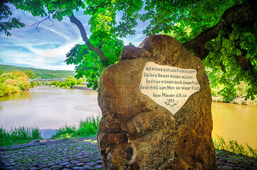 Historic weserstein monument at the Confluence of Fulda and Werra river, which form Weser river, Hann. Münden, Hesse, Germany