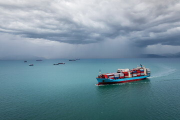 Obraz premium shipping logistic cargo container ship in sea import export goods and distributing products to dealer and consumers across worldwide, by container ship transport business, industry delivery service. 