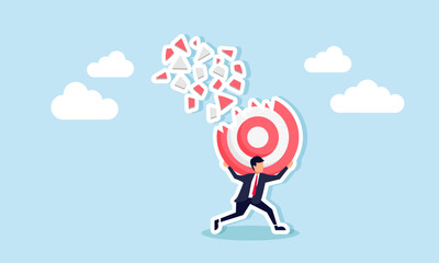 A businessman holds a broken target board with pieces scattering, illustration of saving business targets from danger and business problems