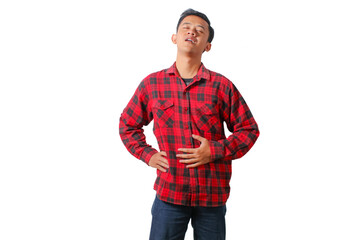 Fototapeta premium Asian man wearing a plaid shirt showing full depth, and pressing it with his hand. Isolated on white background.
