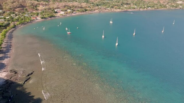 magnificent aerial view of taiohae bay by setting sun and very good weather on the island of NUKU HIVA in the Marquesas archipelago in French Polynesia