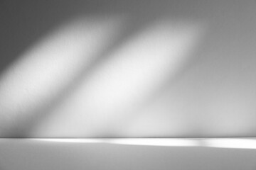 Wall interior background, studio and backdrops show products.with shadow from window color white and grey. background for text insertion and presentation product	