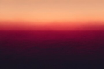 A stunning gradient sunset over the calm ocean, showcasing hues of orange, pink, and deep red blending into a serene horizon. The tranquil atmosphere evokes peace and reflection.