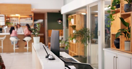 Receptionist, bell and luxury with front desk in hotel for hospitality, booking and customer service. Information, lobby and concierge with counter in resort for help, assistance and reservation