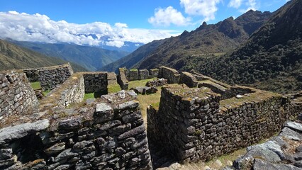 Ruins of buildings at Sayacmarca, lost Inca miliary fortress located along the Inca Trail to Machu...