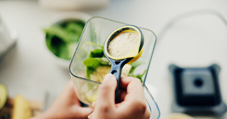 Hands, person and powder with blender in kitchen with organic ingredients, prepare smoothie and...
