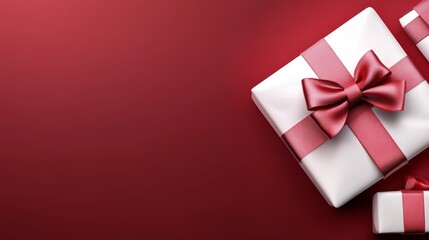 Elegant white gift boxes with red bows on a festive red background perfect for holiday celebrations and special occasions