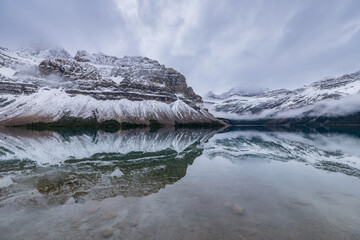 Bow Lake Banff National Park After Rain Snow Reflection