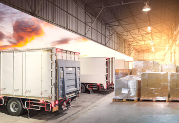 Bulk Pallets of Package Boxes Wrapped Plastic Stacked on Pallets. Trucks Loading at Warehouse Dock. Distribution Warehouse Shipping, Supply Chain Supplies, Shipment. Freight Truck Logistics Transport.