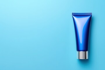 Blank Blue Cosmetic Tube Mockup with Space for Design on Light Blue Background