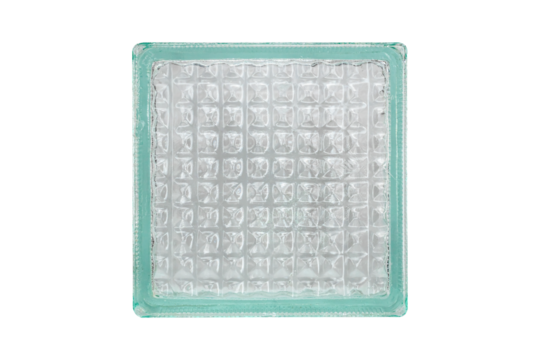Old glass block with turquoise tint is isolated.