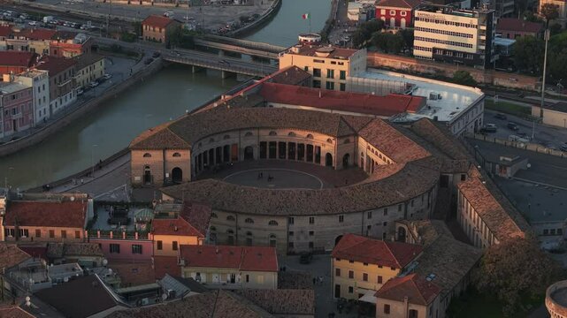 Aerial orbit of Senigallia, Italy with the Foro Annonario and Misa River