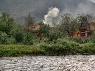 Tourist recreation camp on the bank of the Ursul River early in the morning.