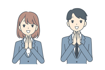 手を合わせるビジネスマンとビジネスウーマン