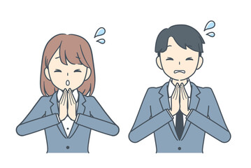 謝罪するビジネスマンとビジネスウーマン