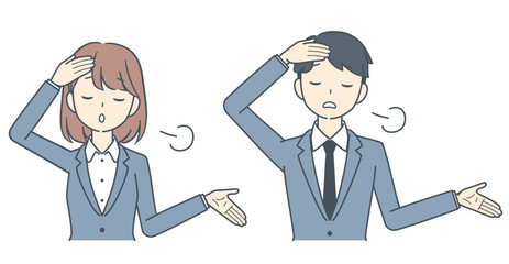 呆れた表情でため息をつくビジネスマンとビジネスウーマン