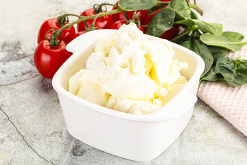 Soft cream cheese in the bowl