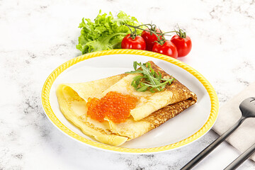 Russian pancake with red caviar