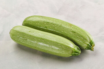 Raw green ripe zucchini vegetable