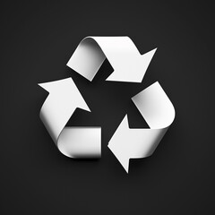 White three-dimensional recycling symbol on a dark background