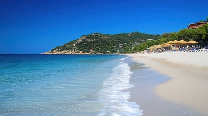 The picture of the sea, the beach and the bright blue sky is a beautiful sea view in summer, giving a refreshing and relaxing feeling.